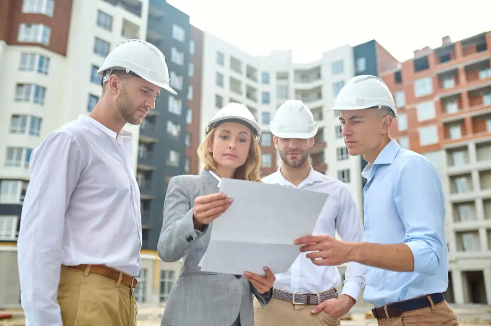Local Building Company in Illawarra discussing construction plans for a residential project.